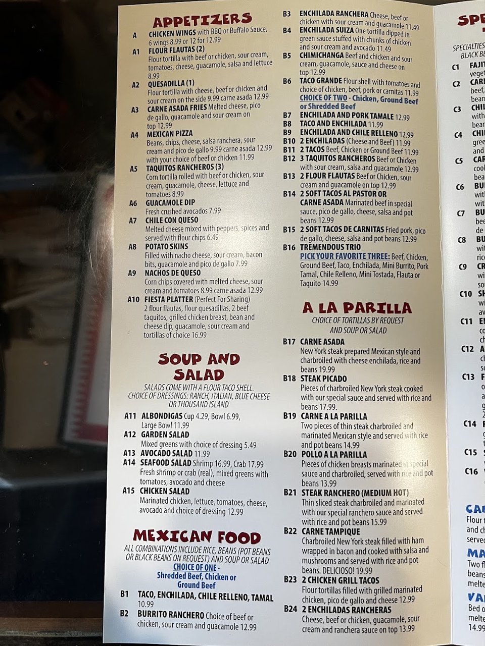 Shrimp cocktail, ceviche, and fajitas on display.